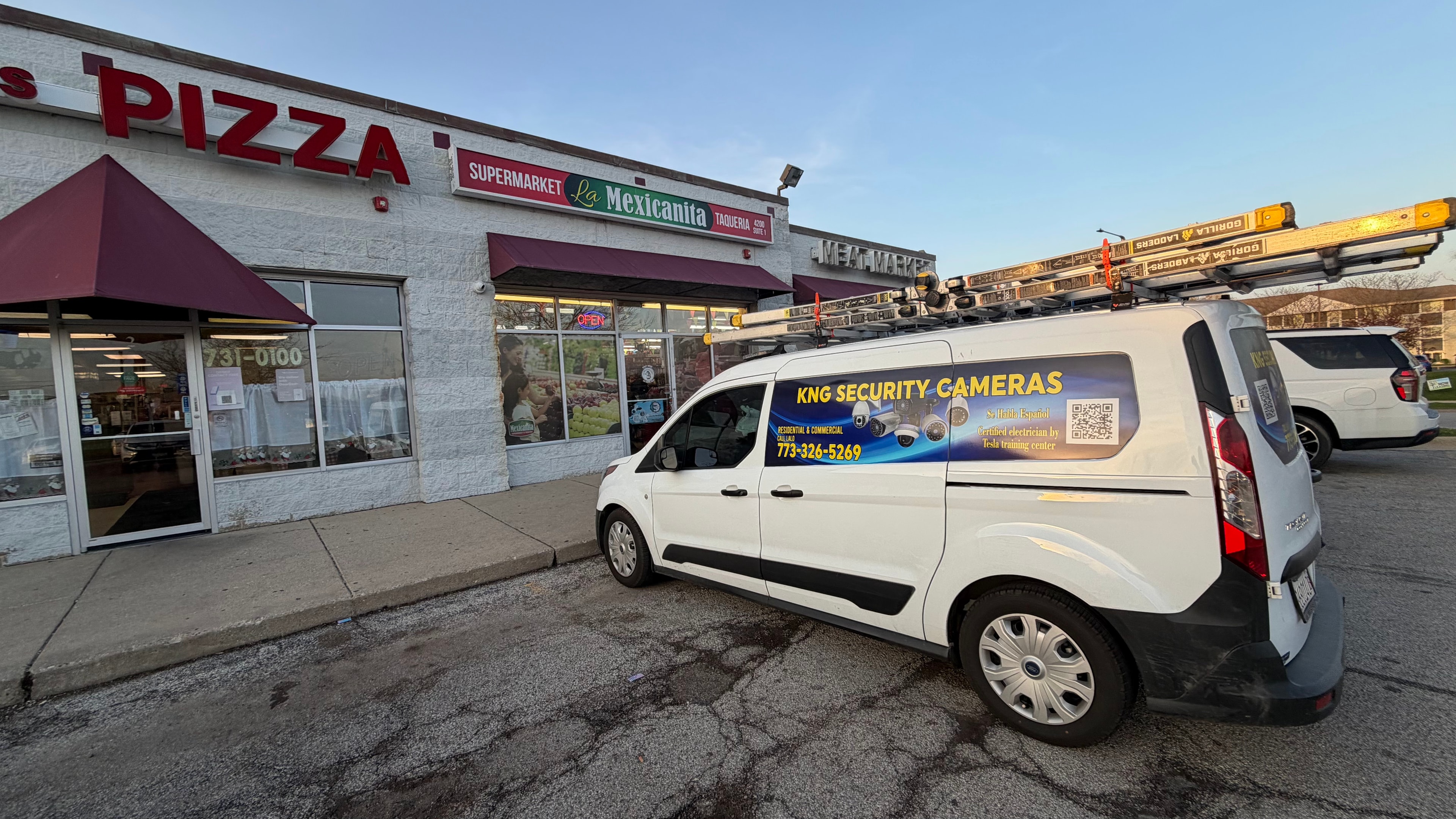 KNG Security Cameras van at commercial job site
