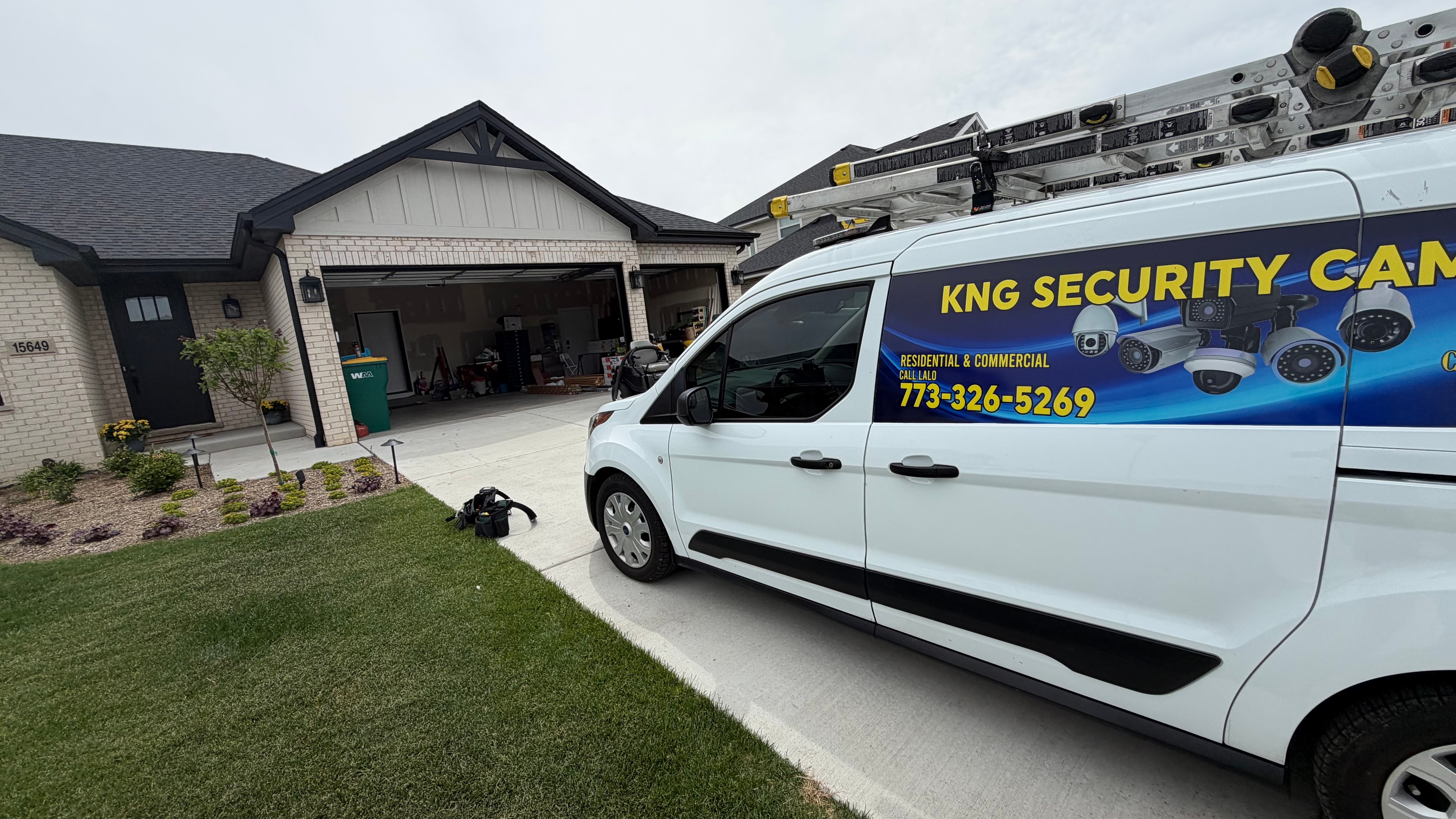 KNG Security Cameras van at retail job site